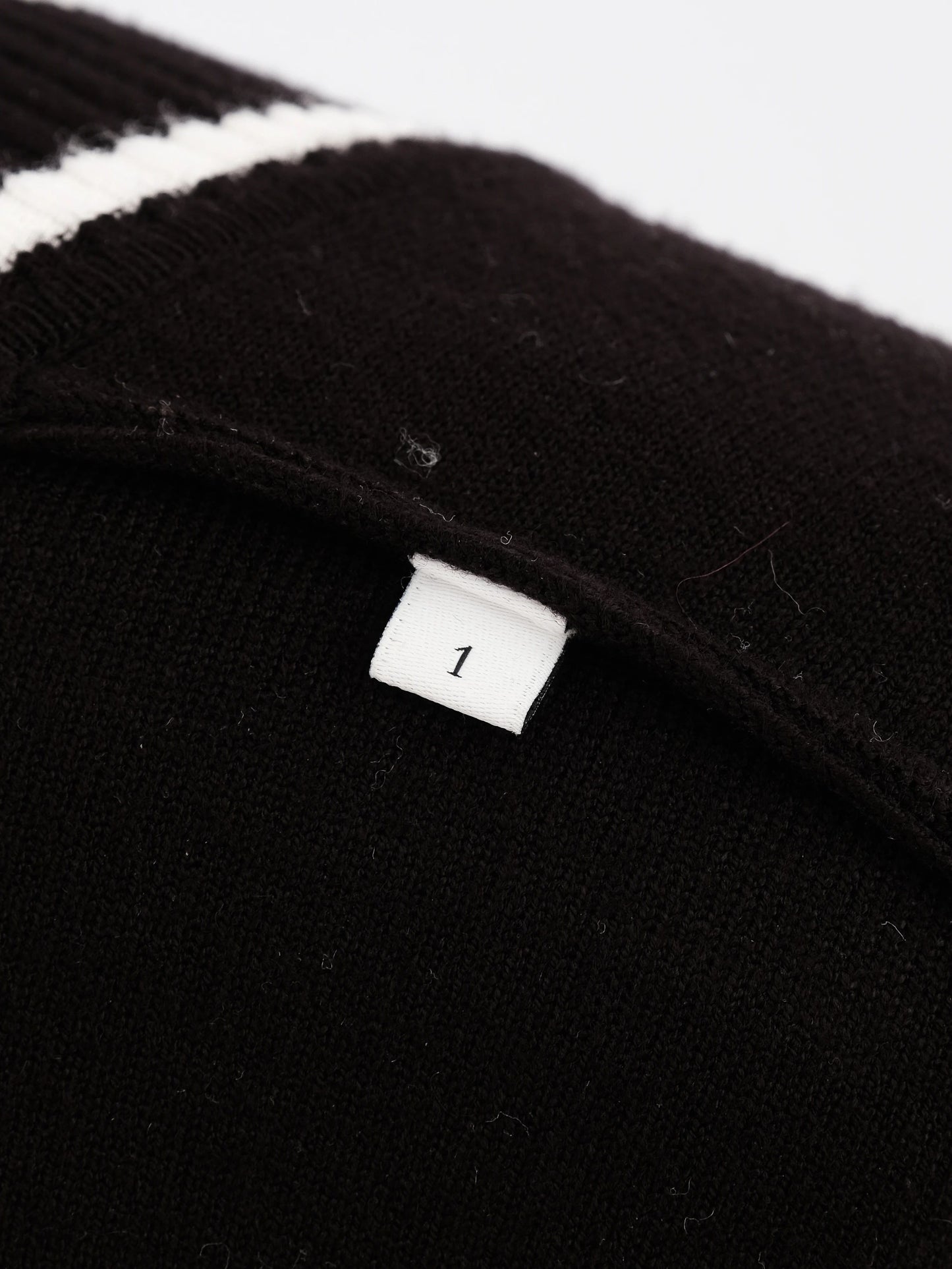 excellent sandro black cardigan with white trim size m
