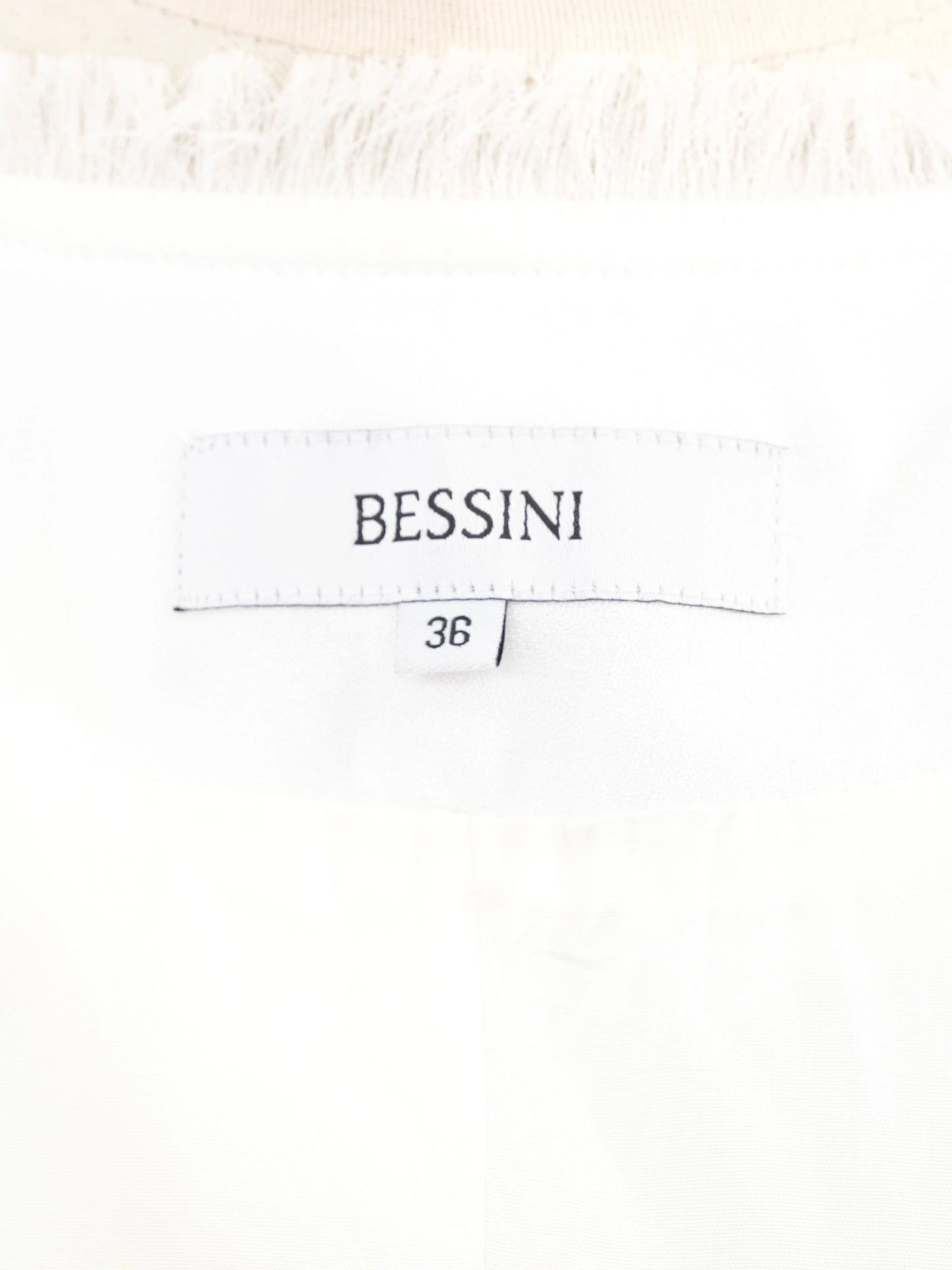 average bessini white viscose jacket size xs with decorative stitching