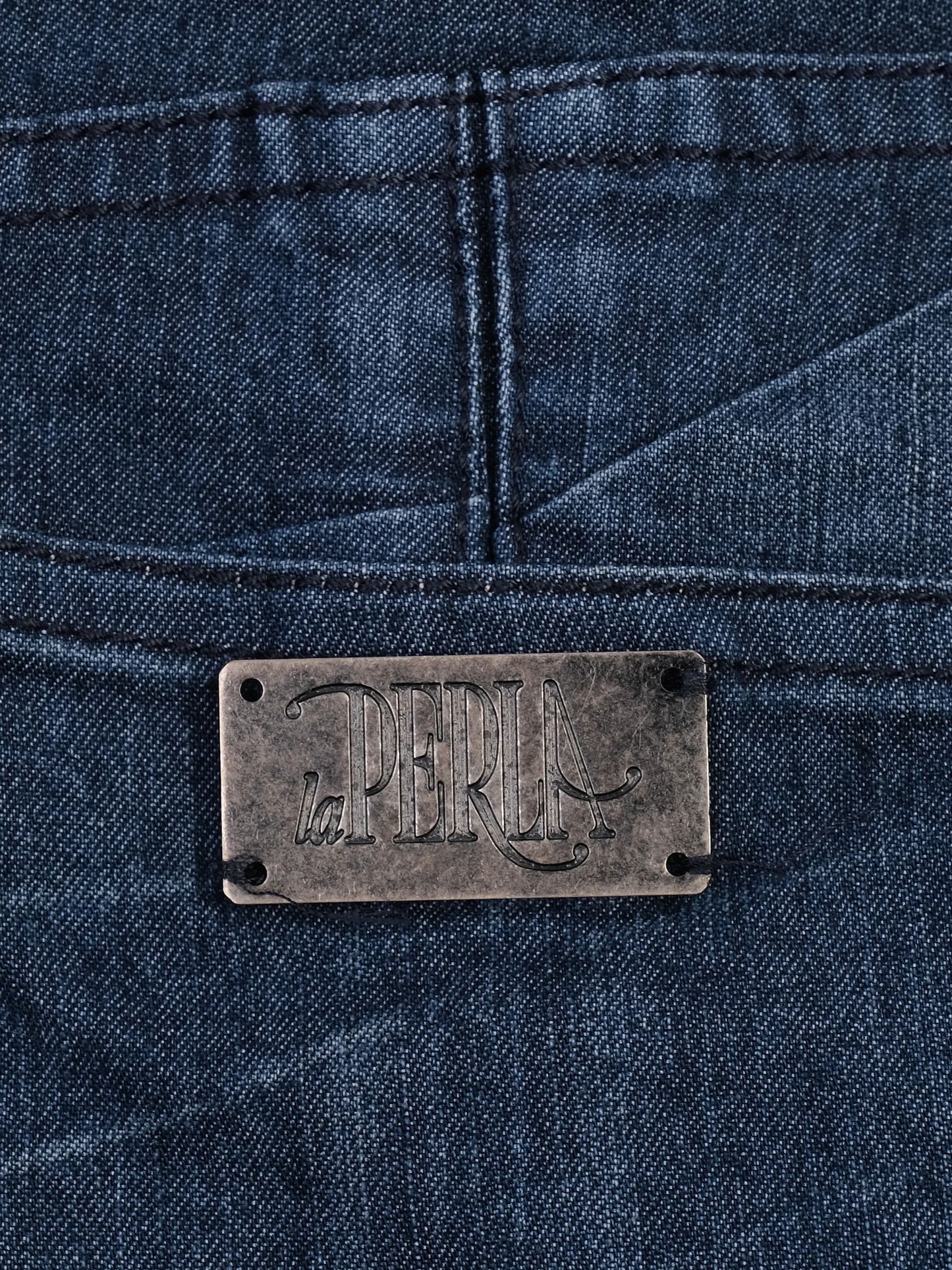 excellent la perla blue denim skirt size m with unique details