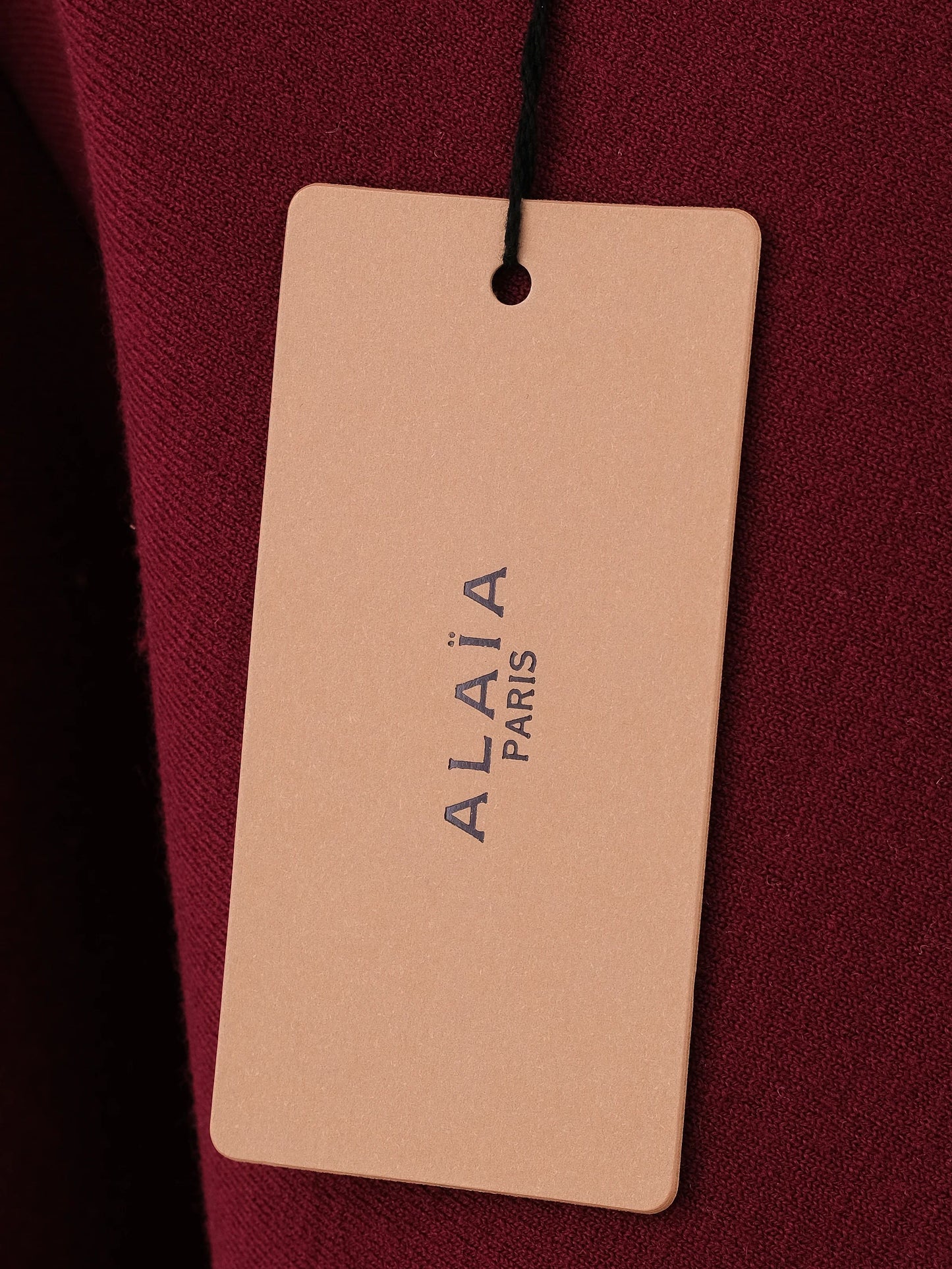 new alaia burgundy wool long sleeve dress with pleated skirt
