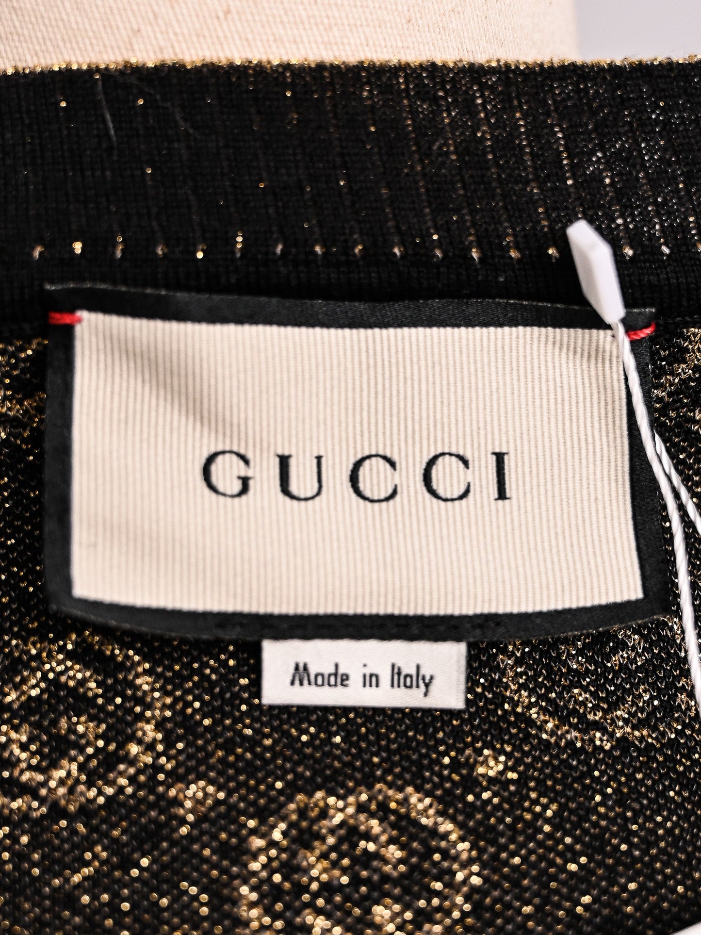 perfect gucci black wool short-sleeved sweater with gold accents