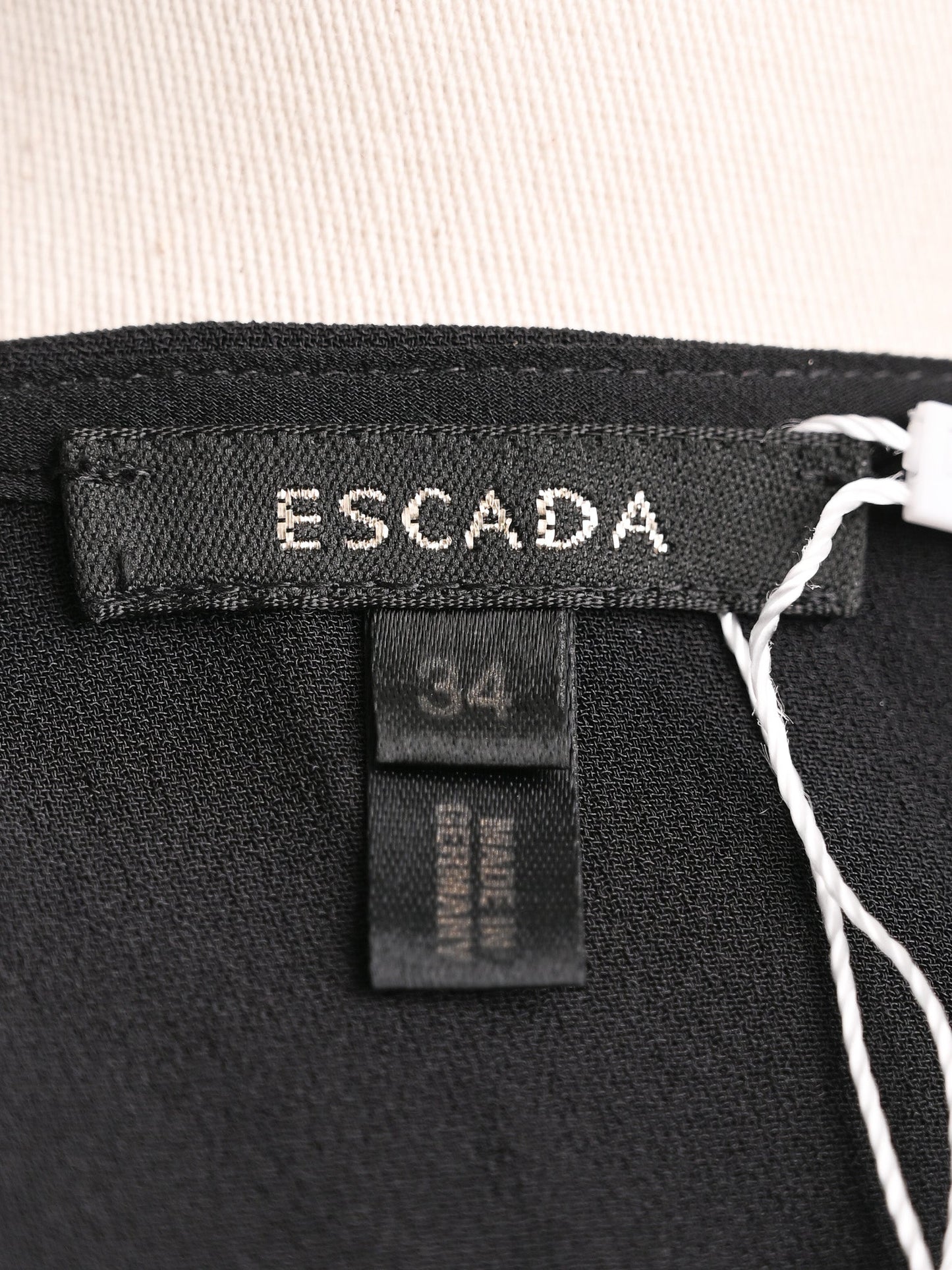 excellent escada black silk blouse xxs with ruffled detail