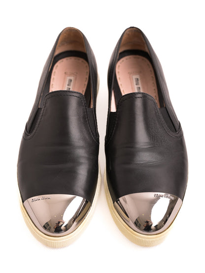 Excellent Miu Miu Black Leather Slip-On Shoes Size 40 with Metallic Toe Cap