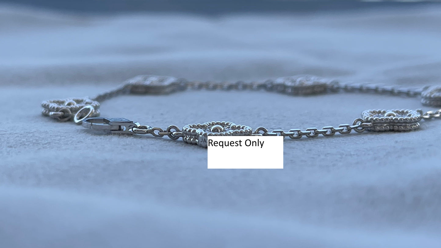 van cleef & arpels sweet alhambra diamond pave 6 motifs white gold bracelet