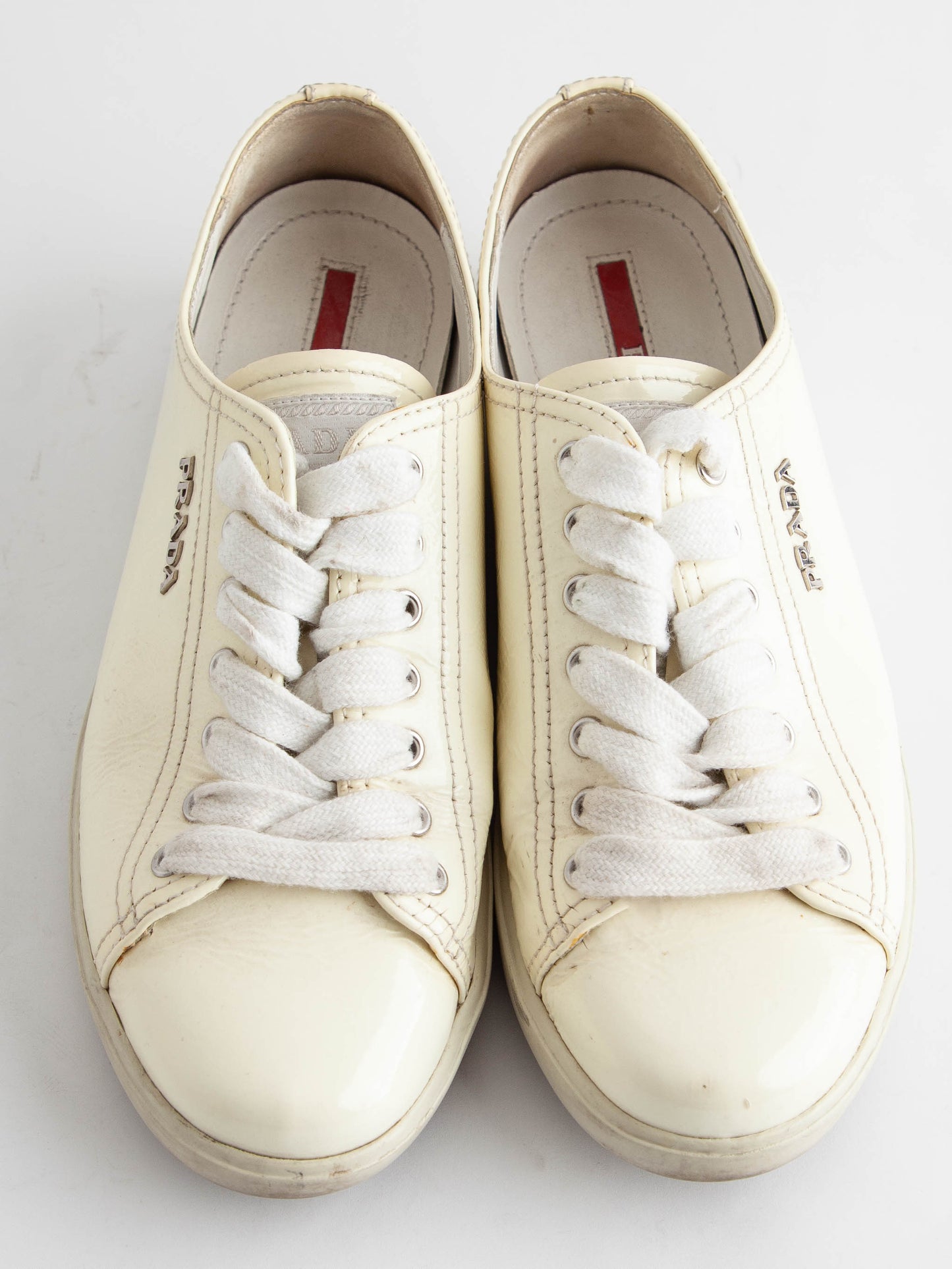 average condition prada yellow lacquer sneakers size 36
