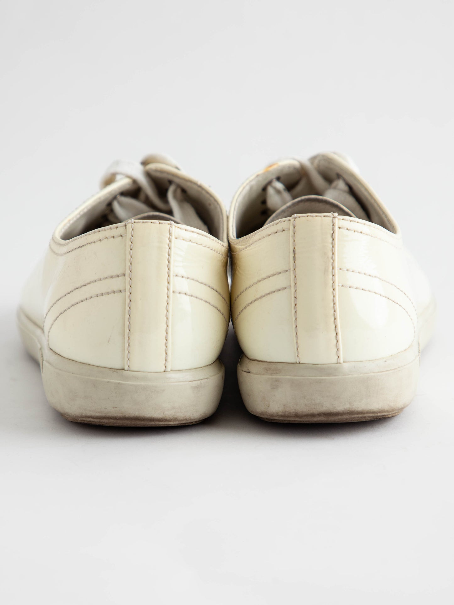 average condition prada yellow lacquer sneakers size 36