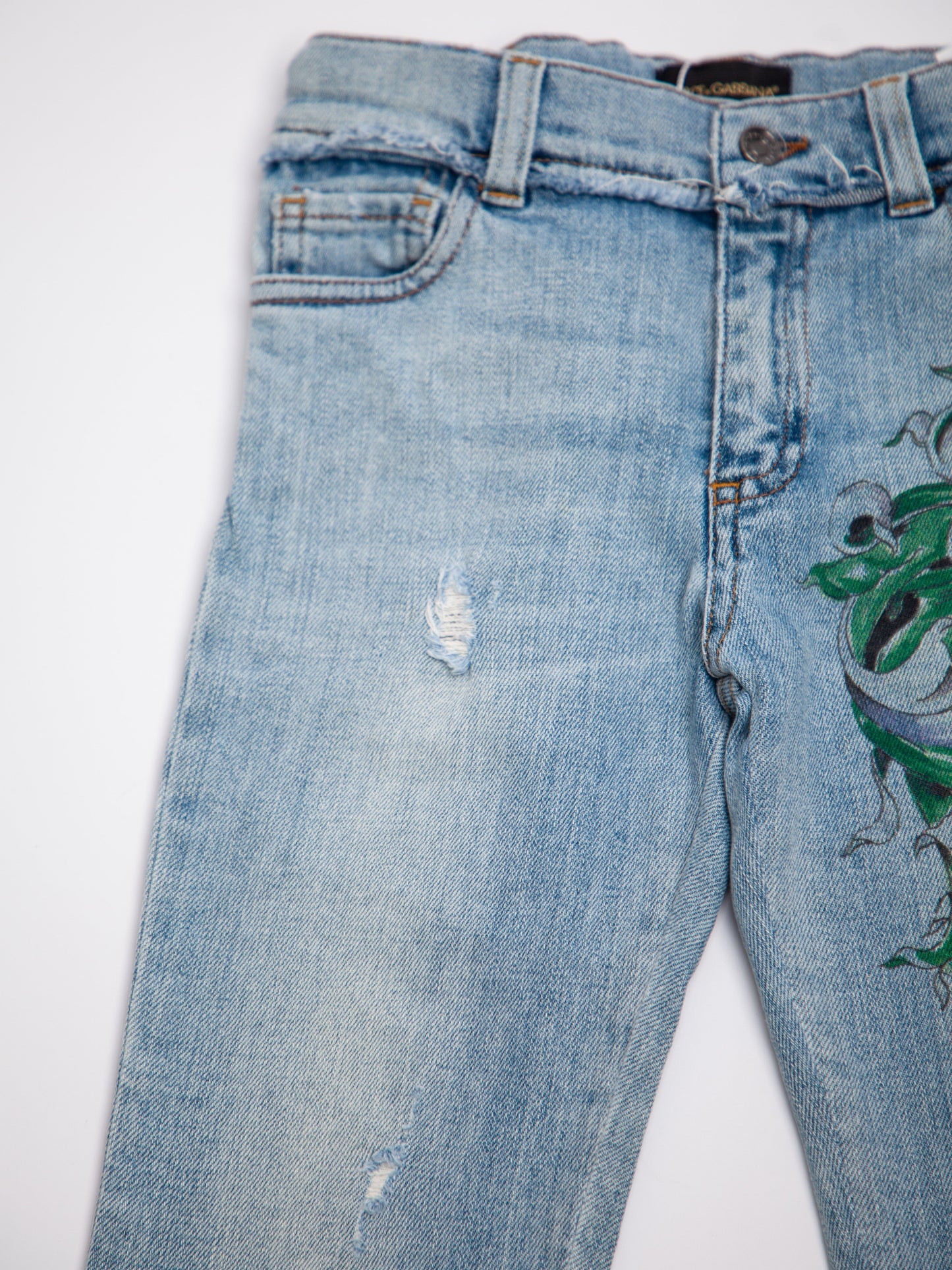 average dolce gabbana blue cotton jeans for kids size 7 with embroidery