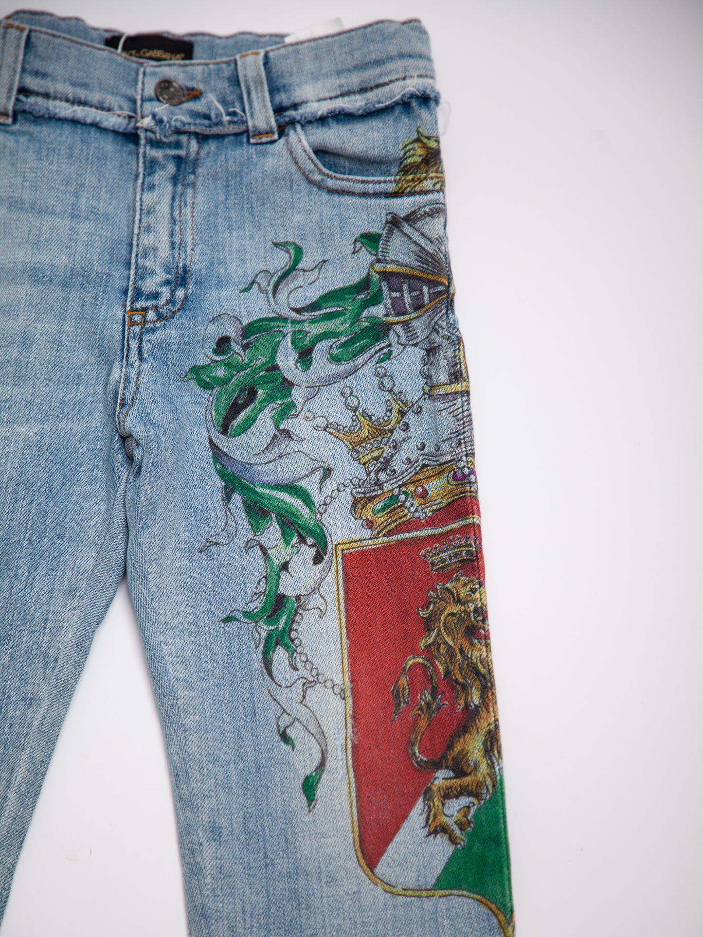 average dolce gabbana blue cotton jeans for kids size 7 with embroidery