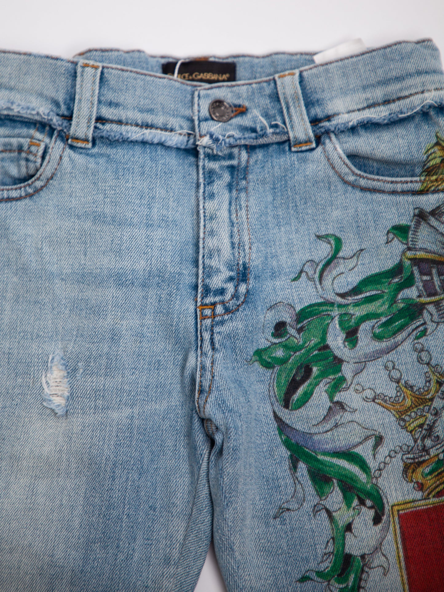 average dolce gabbana blue cotton jeans for kids size 7 with embroidery