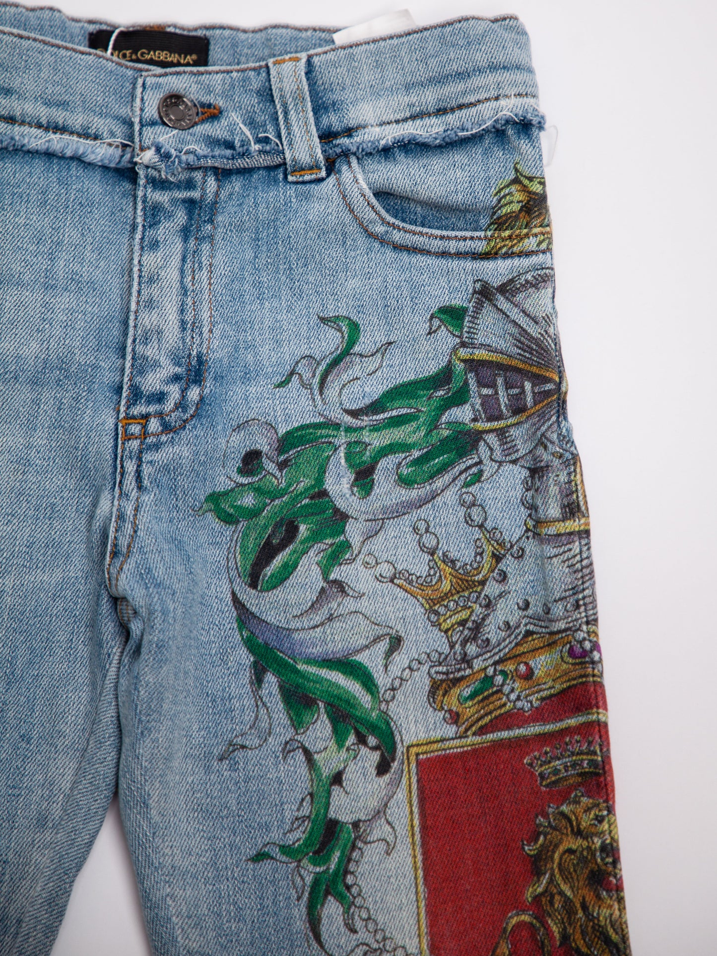 average dolce gabbana blue cotton jeans for kids size 7 with embroidery