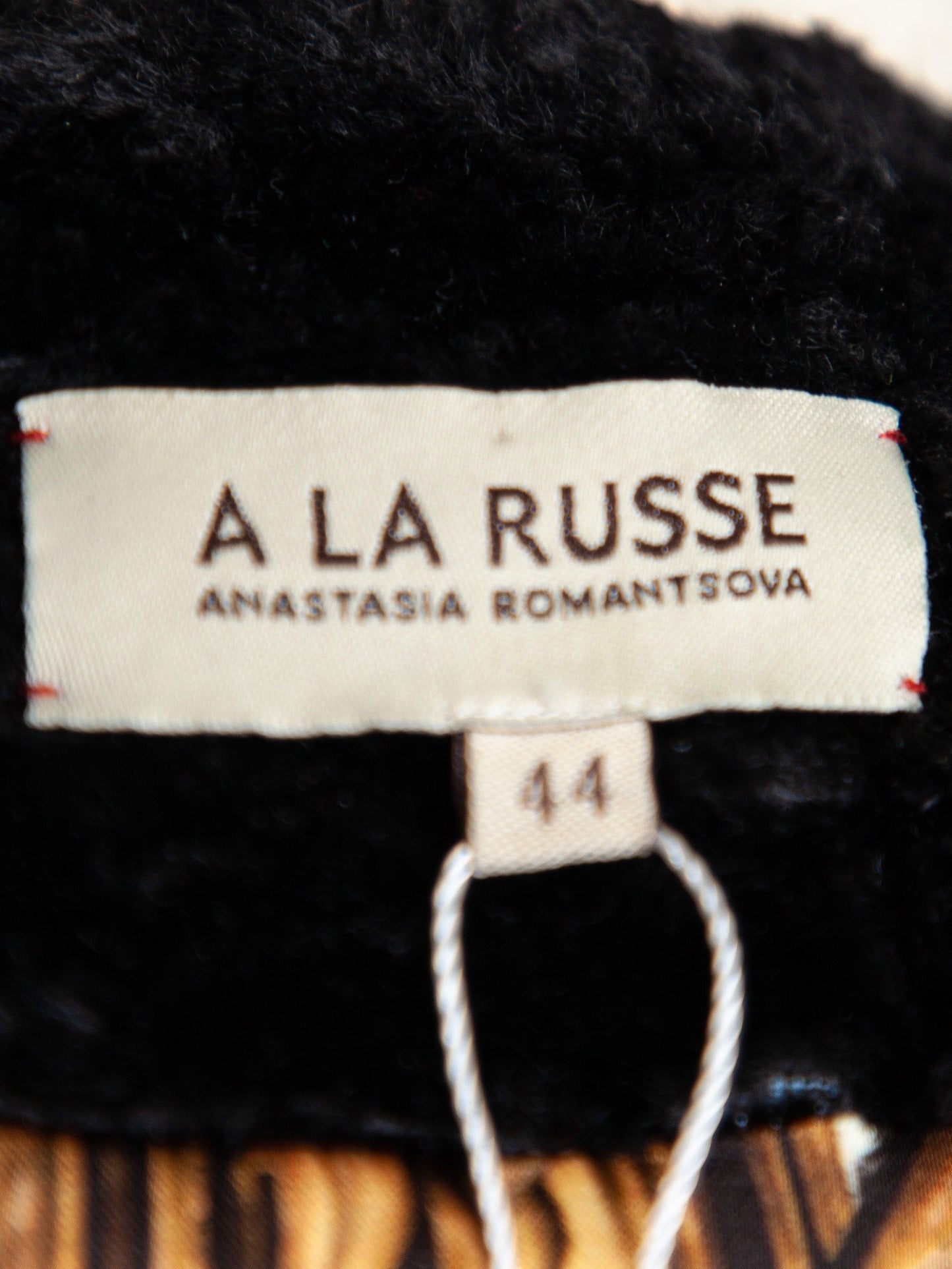 excellent a la russe black long coat size m with textured pattern