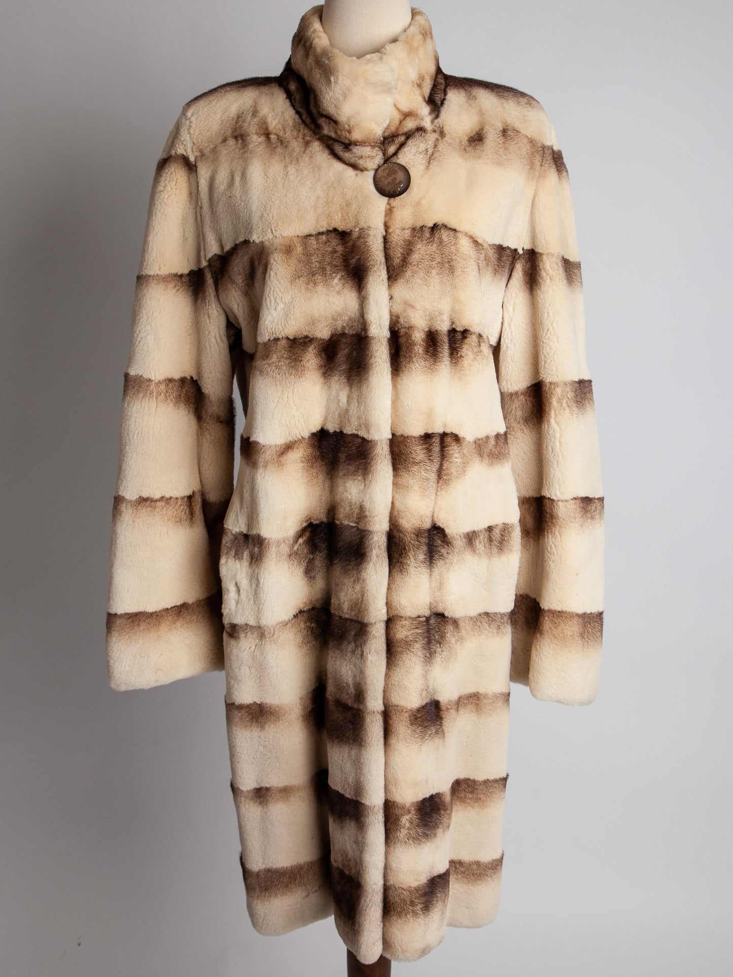 excellent scandinavia white fur coat with horizontal brown stripes
