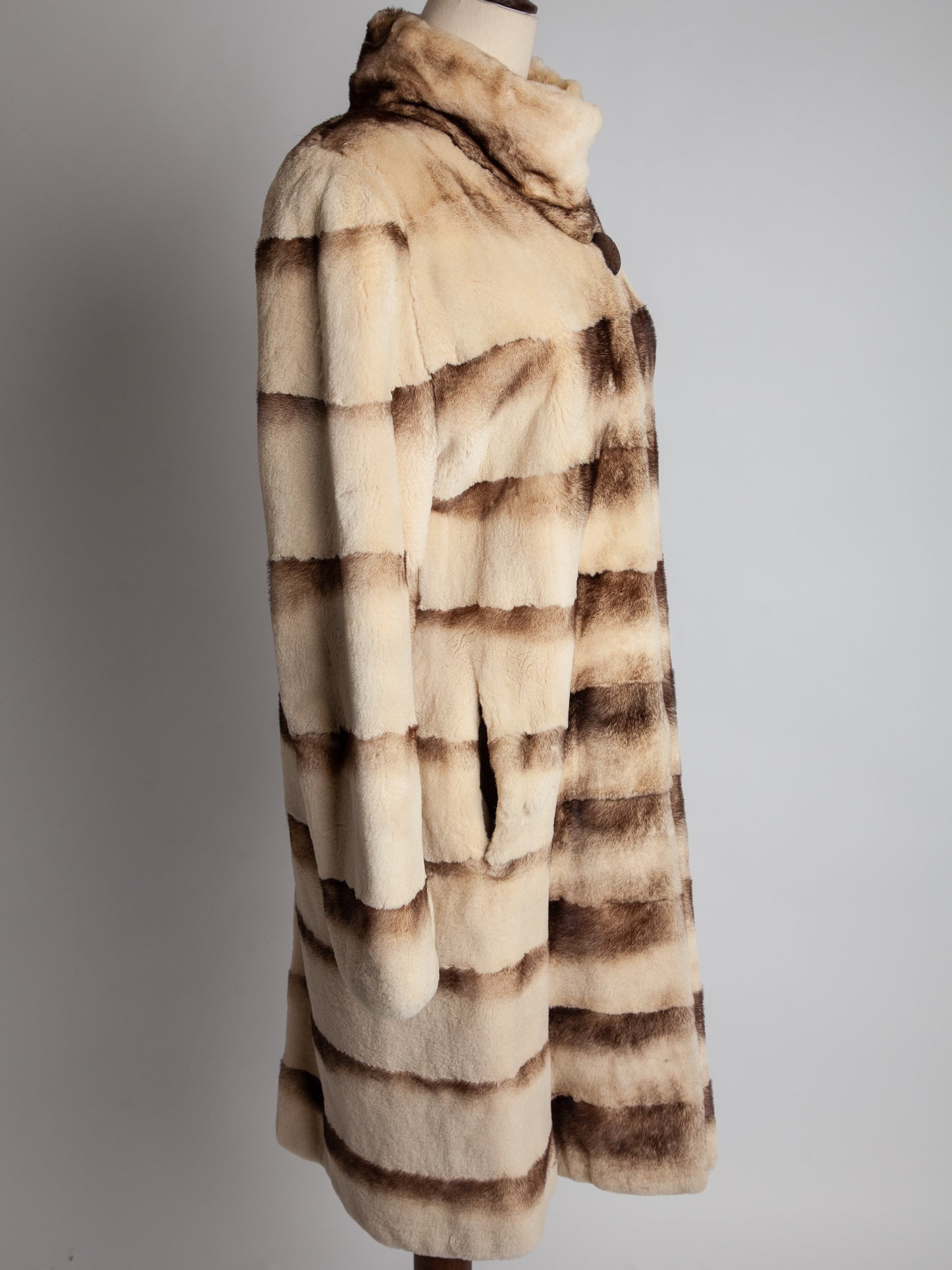 excellent scandinavia white fur coat with horizontal brown stripes