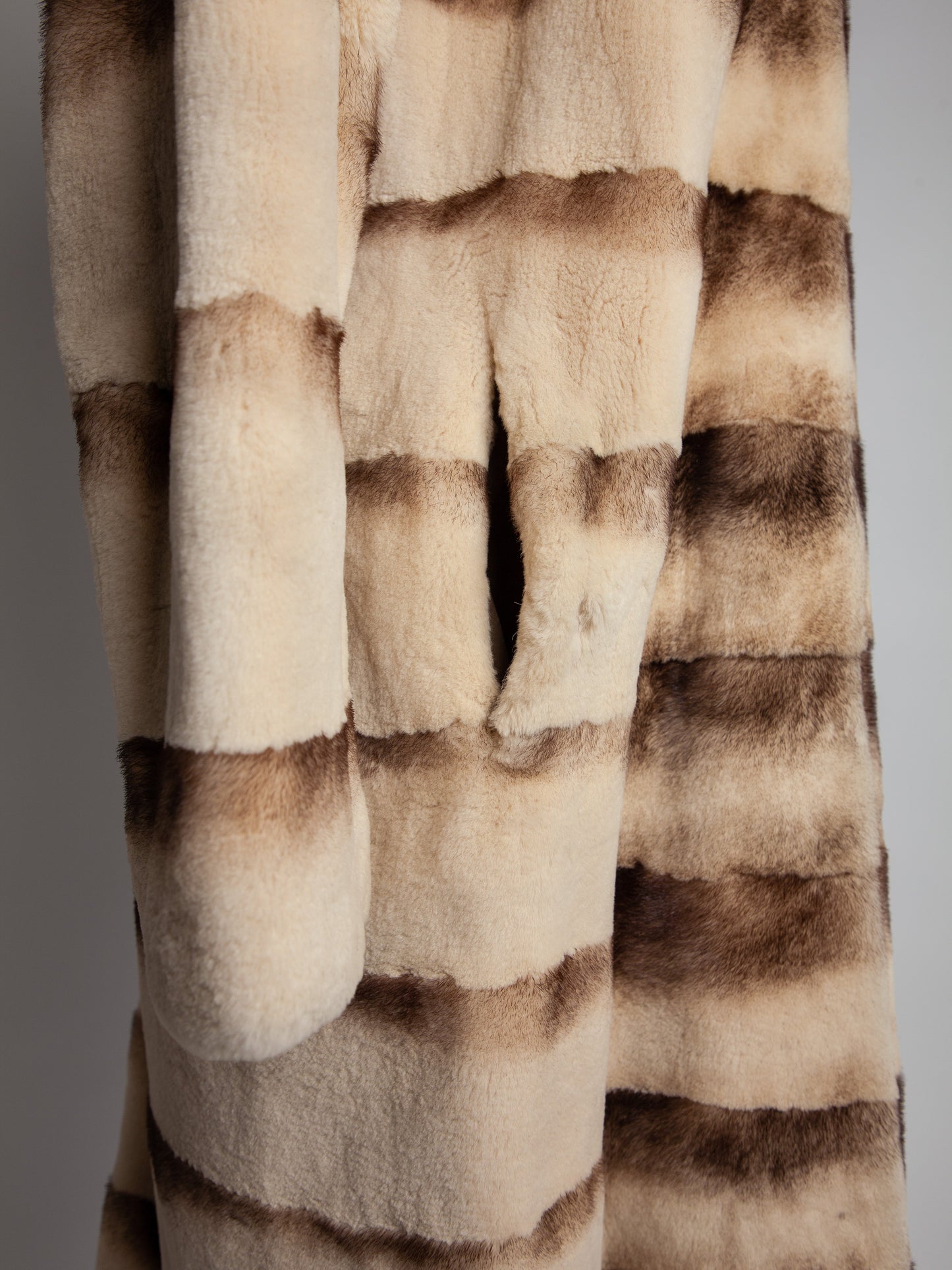 excellent scandinavia white fur coat with horizontal brown stripes