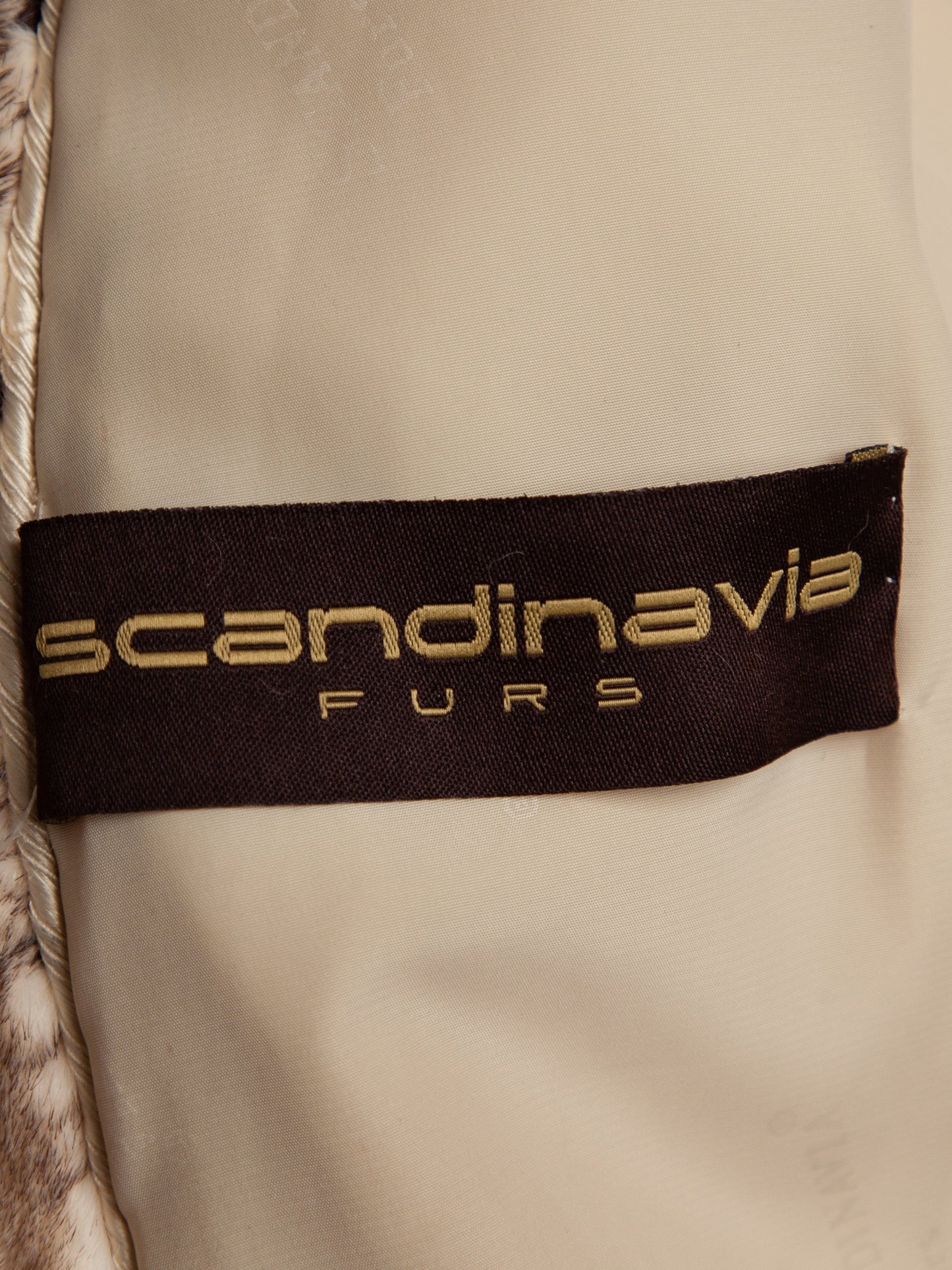 excellent scandinavia white fur coat with horizontal brown stripes