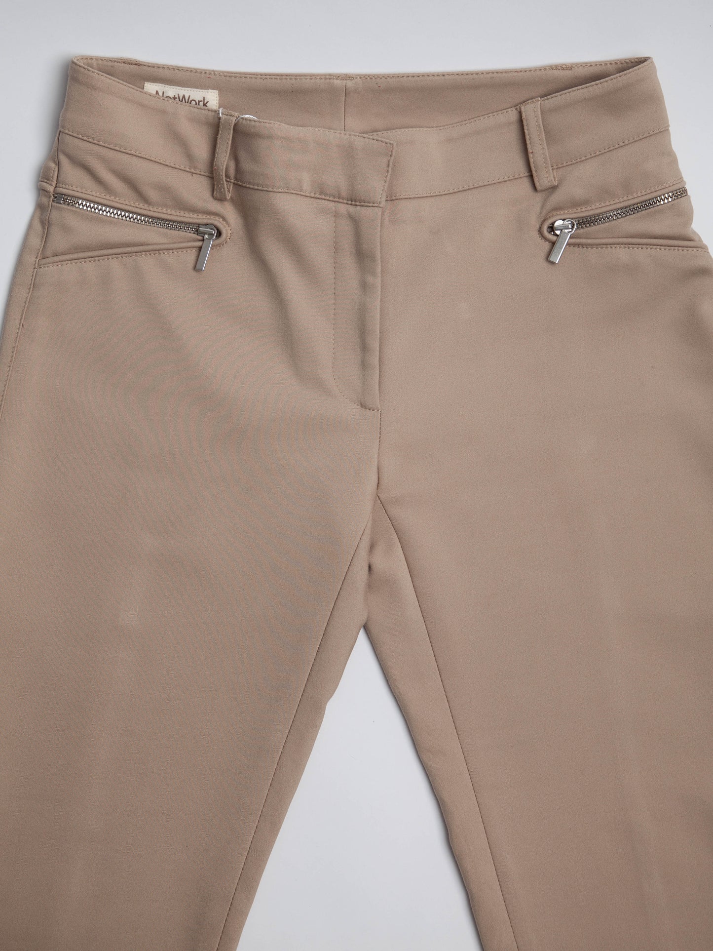 good condition network white acrylic women’s pants size xs