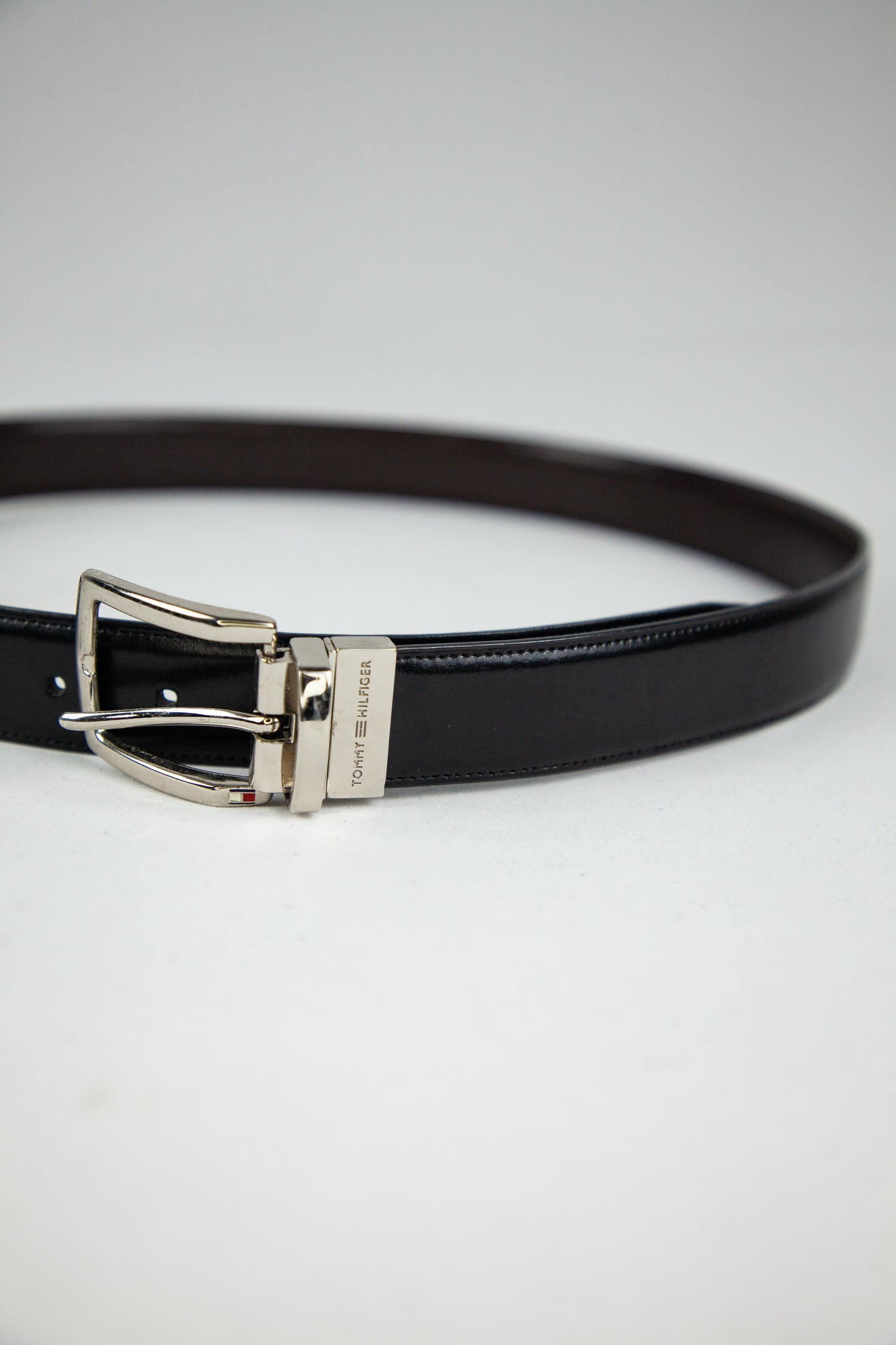 good tommy hilfiger black genuine leather belt with silver buckle