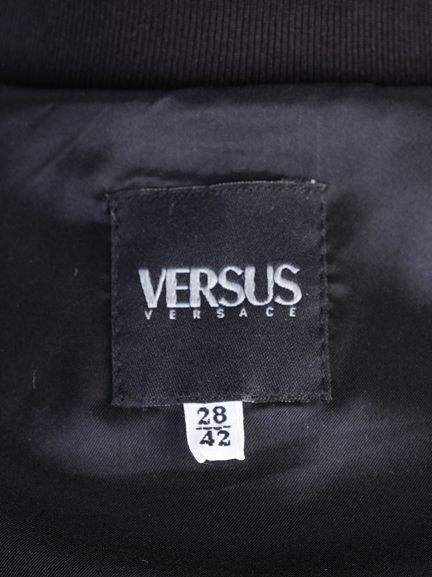 excellent versus black leather jacket with fabric accents size l
