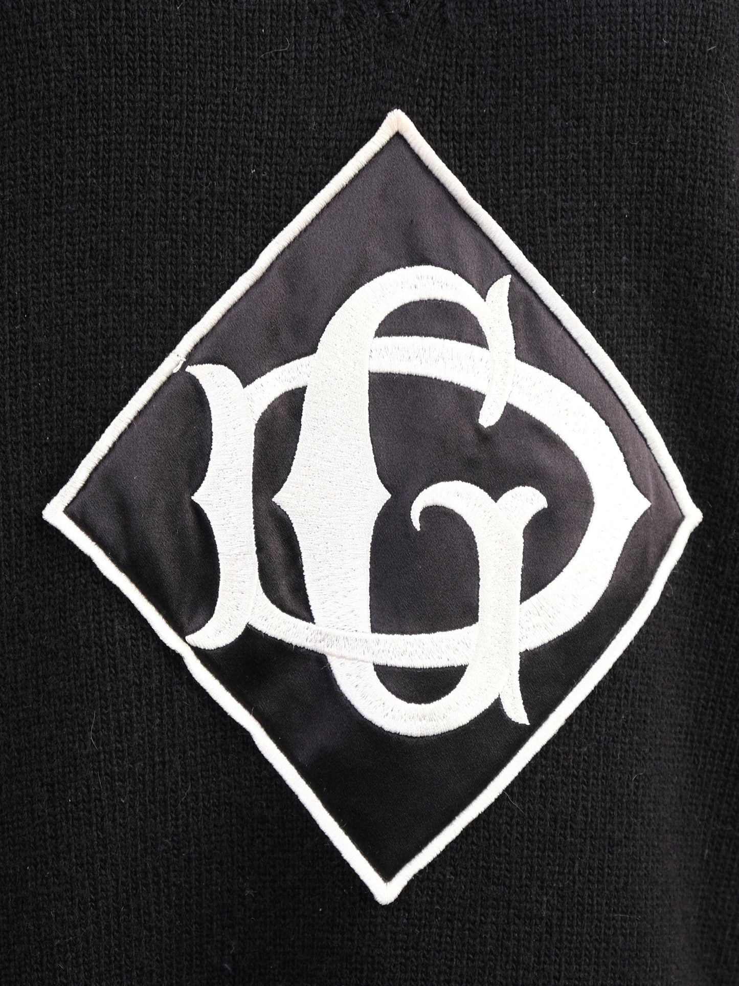 excellent dolce gabbana black wool v-neck sweater with logo