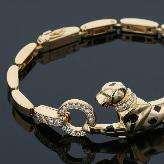 Cartier Panthere gold, diamonds, garnets, onyx and gold bracelet