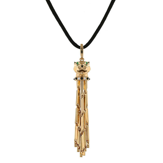 Cartier Panthere gold, onyx, garnets and diamonds pendant
