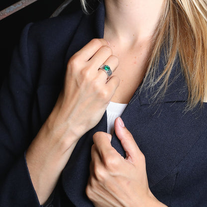 Emerald and gold ring