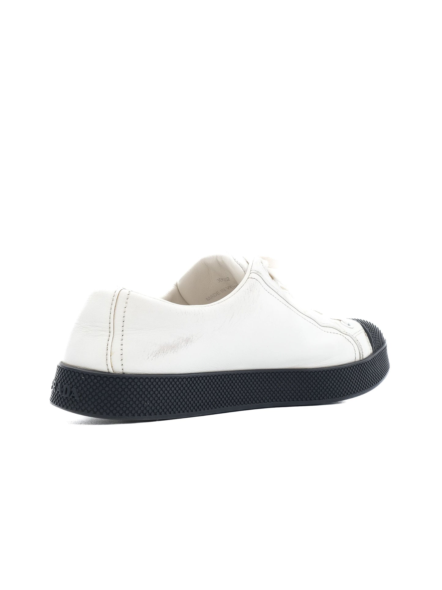 average condition prada white leather sneakers size 36