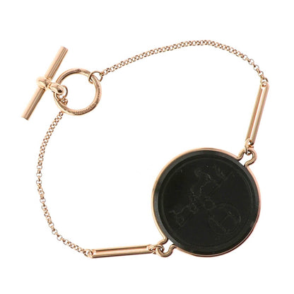 Hermes Ex Libris jade and gold bracelet.