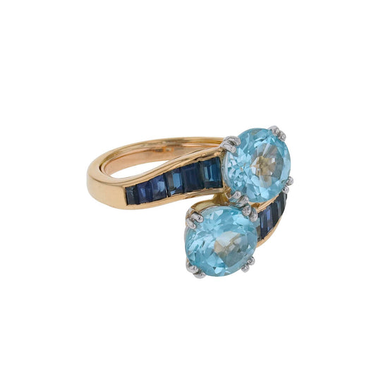 Sapphires, topazes and gold ring
