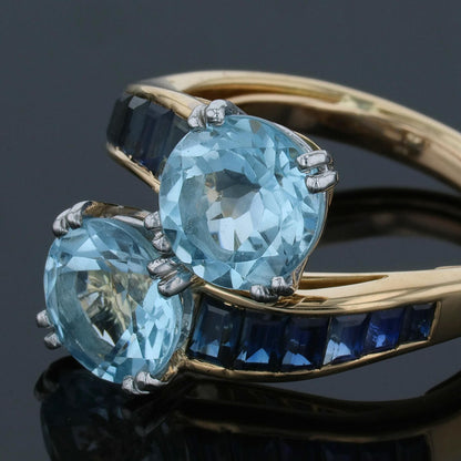 Sapphires, topazes and gold ring