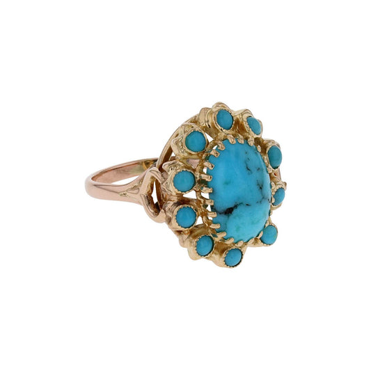 Turquoises and gold ring