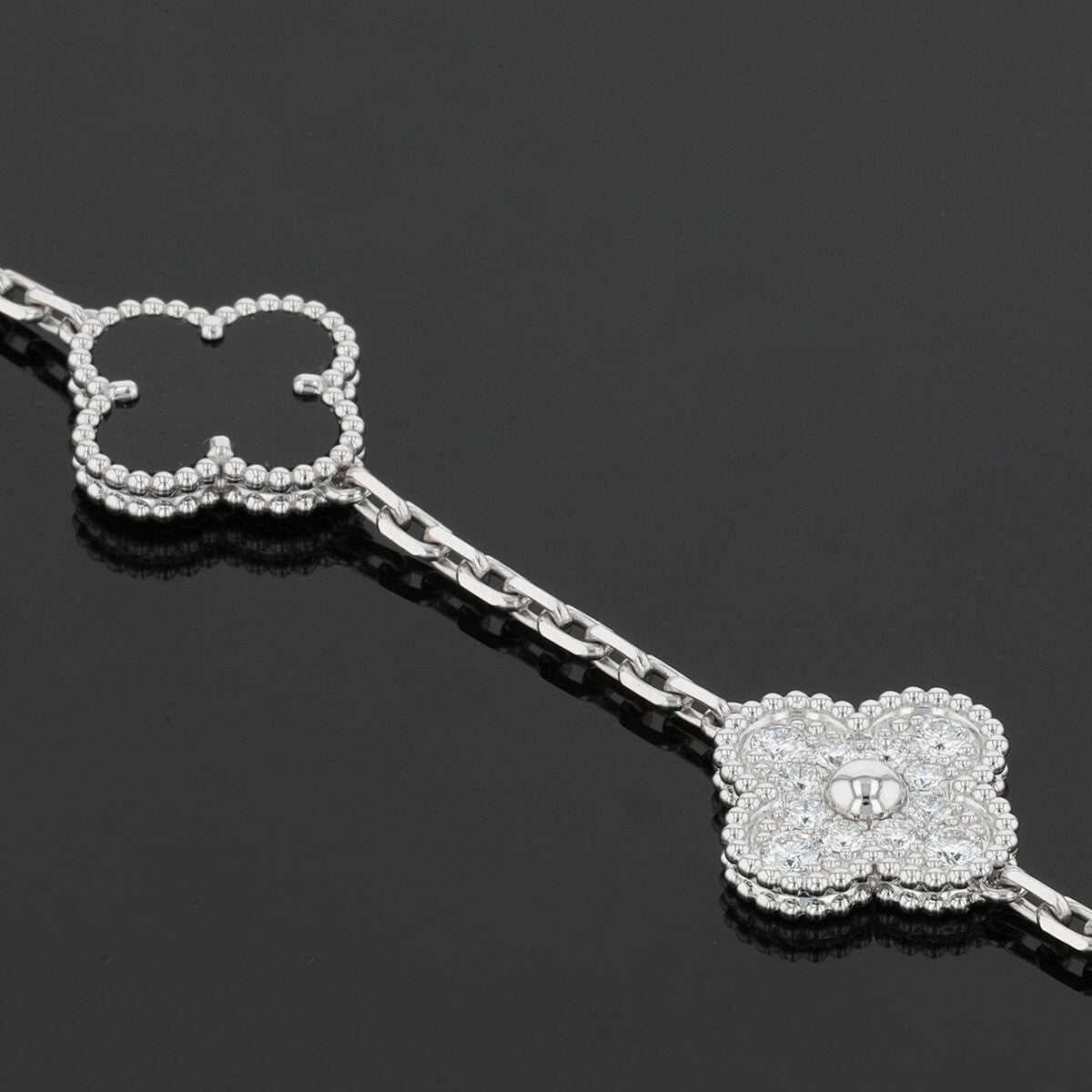 van cleef & arpels alhambra onyx, diamonds and gold bracelet