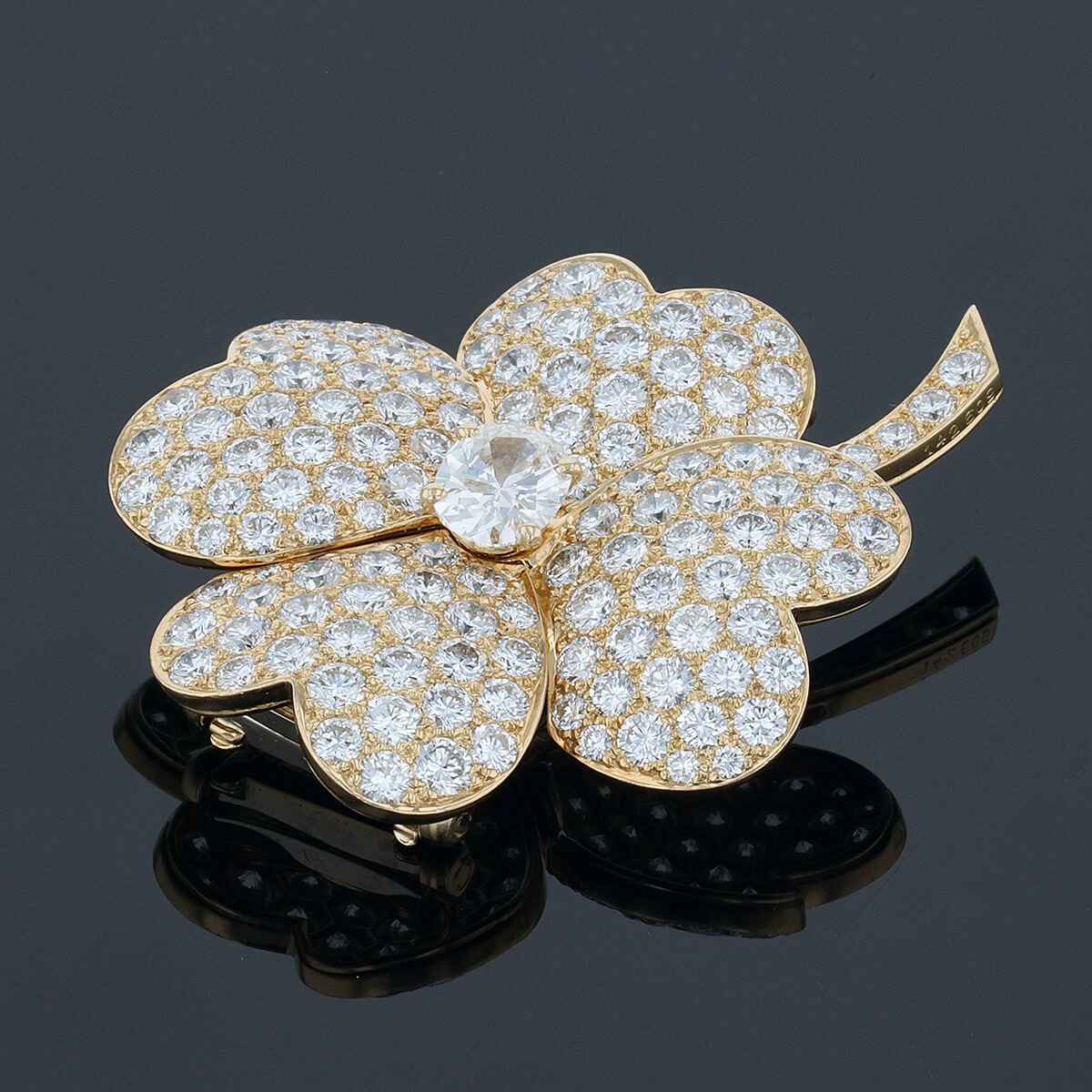 van cleef & arpels cosmos diamonds and gold brooch