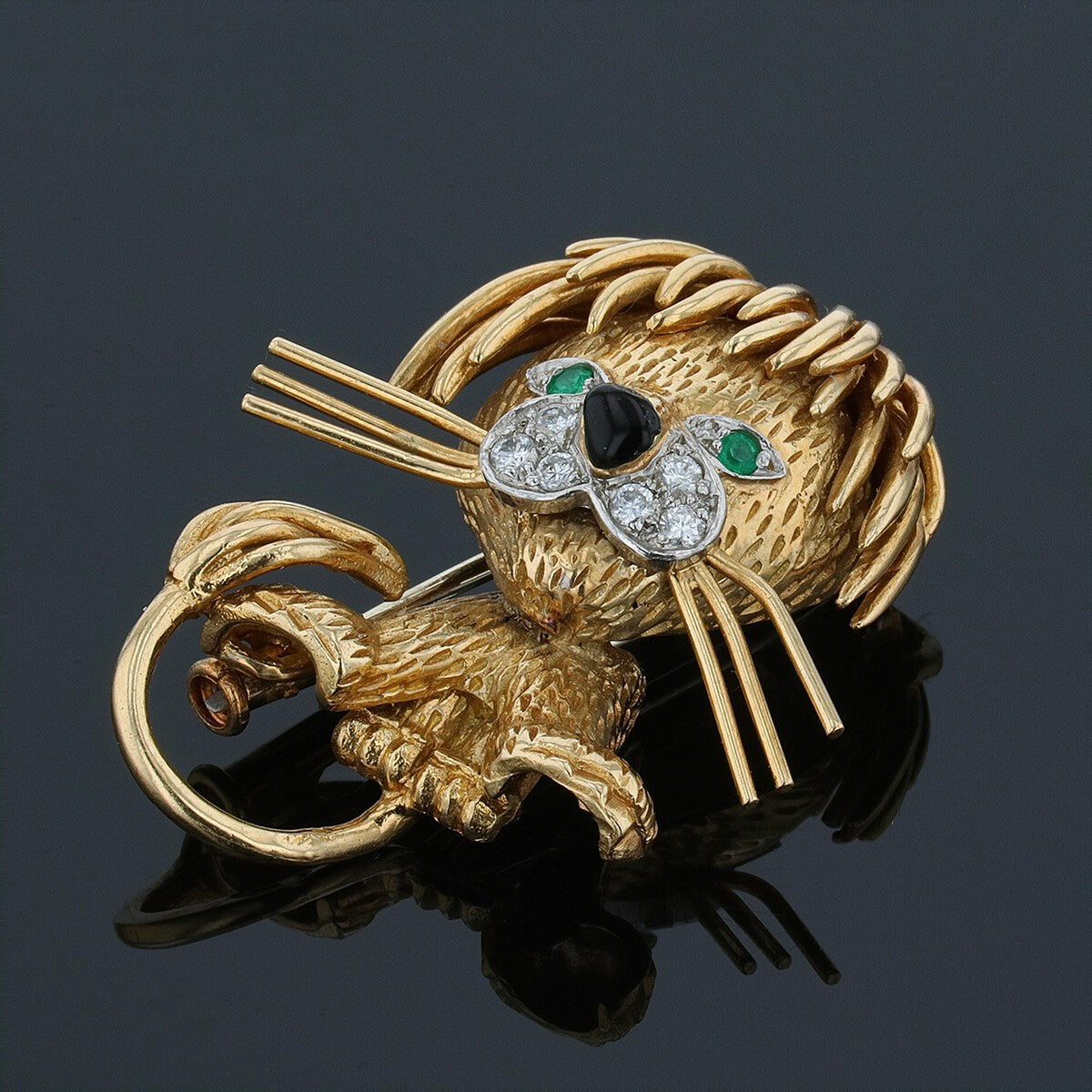 van cleef & arpels lion ebouriffž gold, platinum, diamonds, emeralds and enamel brooch