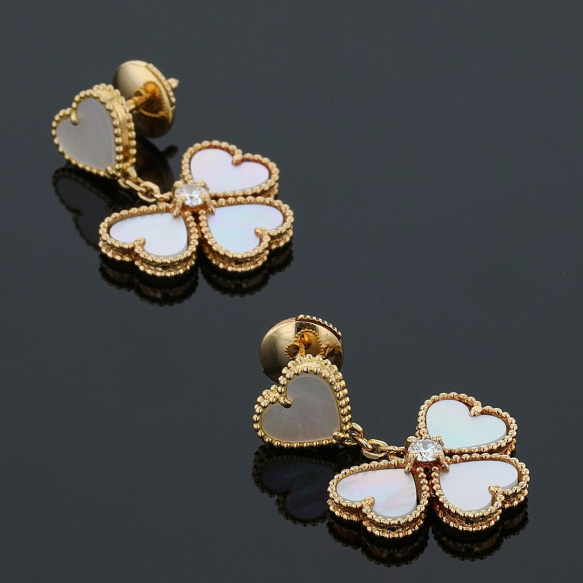 van cleef & arpels mother-of-pearl, diamond and gold earrings