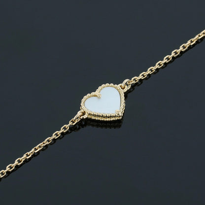Van Cleef & Arpels Sweet Hearts mother of pearl and gold bracelet