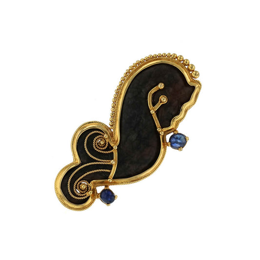 Viviane Debbas hard stone, sapphires and gold brooch