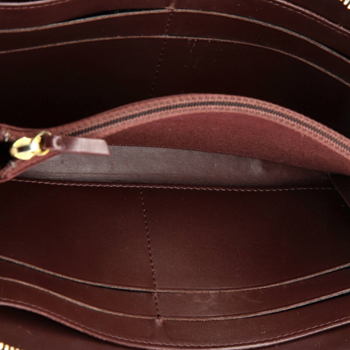 zip around wallet quilted caviar long